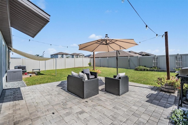 9839 Lemon Drop Loop, Sun City Center, FL 33573 - fenced backyard with a patio and outdoor lounge area