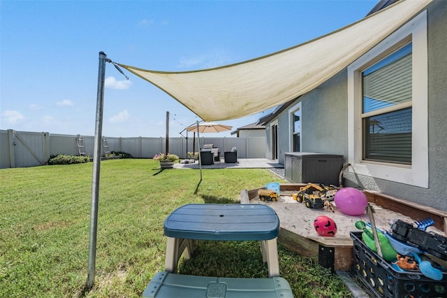 9839 Lemon Drop Loop, Sun City Center, FL 33573 - fenced backyard featuring a patio area