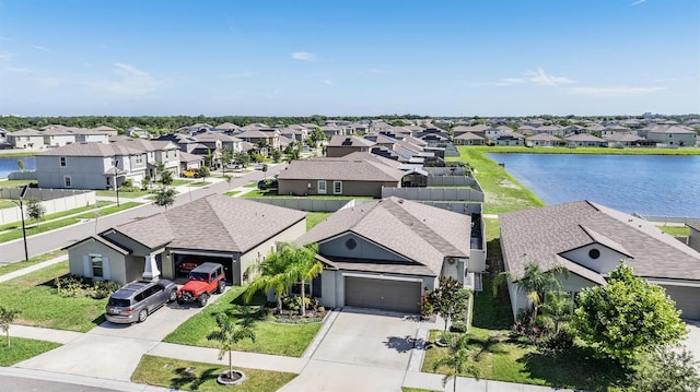 9839 Lemon Drop Loop, Sun City Center, FL 33573 - aerial perspective of suburban area with a nearby body of water