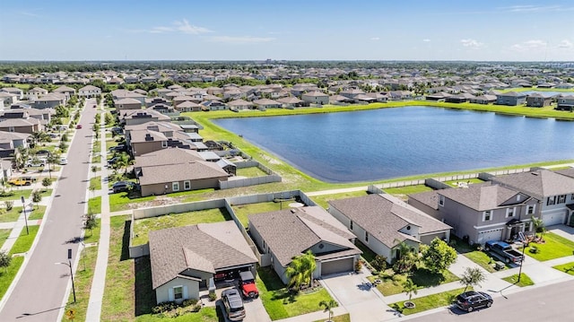 9839 Lemon Drop Loop, Sun City Center, FL 33573 - aerial view of residential area featuring a large body of water