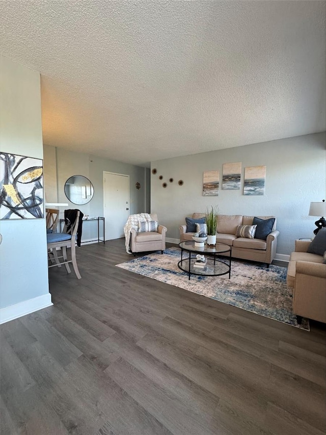 3315 58th Ave S Unit 421, Saint Petersburg, FL 33712 - living room with wood finished floors and a textured ceiling