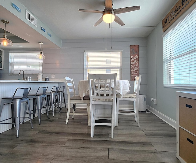18650 Gulf Blvd Unit 314, Indian Shores, FL 33785 - dining area with wood finished floors and ceiling fan