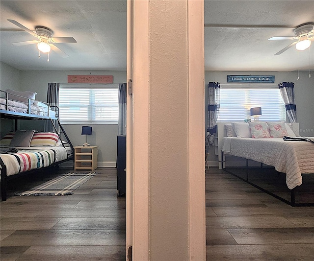 18650 Gulf Blvd Unit 314, Indian Shores, FL 33785 - bedroom with wood-type flooring and a ceiling fan