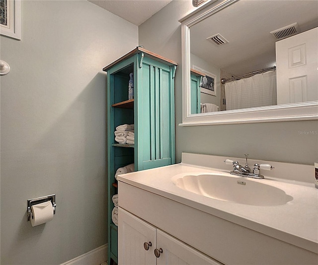 18650 Gulf Blvd Unit 314, Indian Shores, FL 33785 - bathroom with vanity and baseboards