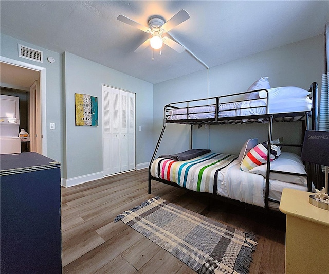 18650 Gulf Blvd Unit 314, Indian Shores, FL 33785 - bedroom with wood finished floors, ceiling fan, and a closet