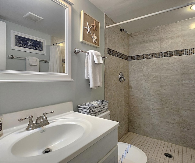 18650 Gulf Blvd Unit 314, Indian Shores, FL 33785 - bathroom featuring a tile shower and vanity