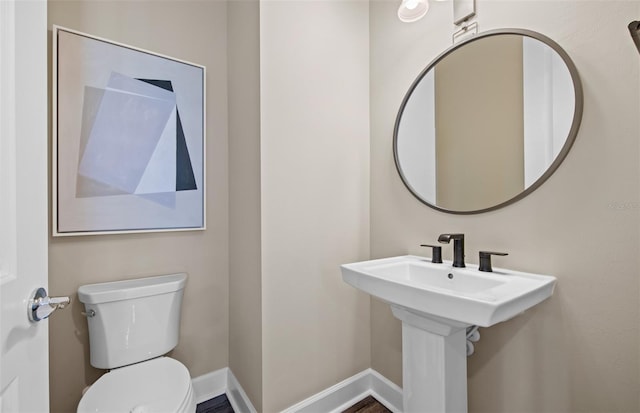16423 Sapphire Point Dr, Lakewood Ranch, FL 34211 - half bathroom with toilet and a sink