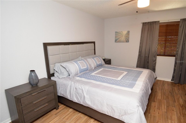 10265 Gandy Blvd N Unit 1409, Saint Petersburg, FL 33702 - bedroom with light wood-style flooring and a ceiling fan