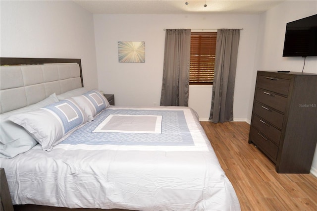10265 Gandy Blvd N Unit 1409, Saint Petersburg, FL 33702 - bedroom featuring light wood-style floors and baseboards