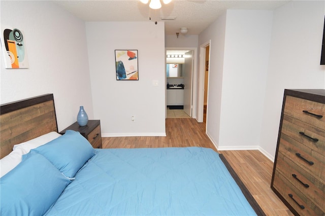 10265 Gandy Blvd N Unit 1409, Saint Petersburg, FL 33702 - bedroom with wood finished floors and a ceiling fan