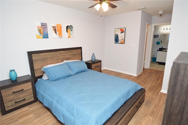 10265 Gandy Blvd N Unit 1409, Saint Petersburg, FL 33702 - bedroom with light wood-type flooring and ceiling fan