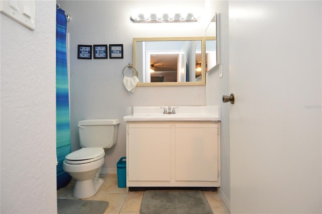 10265 Gandy Blvd N Unit 1409, Saint Petersburg, FL 33702 - bathroom with vanity, tile patterned flooring, and a textured wall