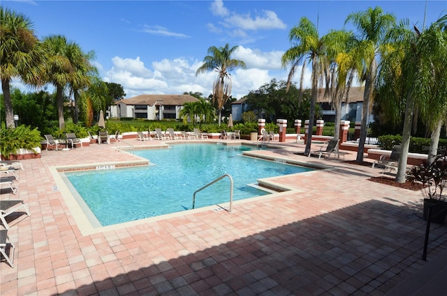 10265 Gandy Blvd N Unit 1409, Saint Petersburg, FL 33702 - community pool featuring a patio