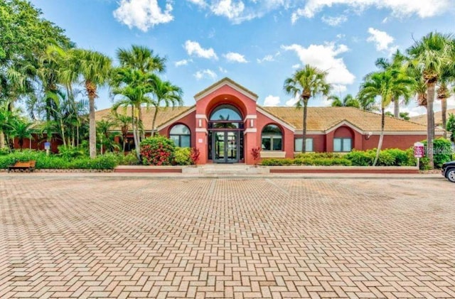10265 Gandy Blvd N Unit 1409, Saint Petersburg, FL 33702 - view of building exterior featuring uncovered parking