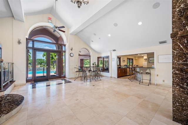 10265 Gandy Blvd N Unit 1409, Saint Petersburg, FL 33702 - entryway with high vaulted ceiling, ceiling fan, and french doors