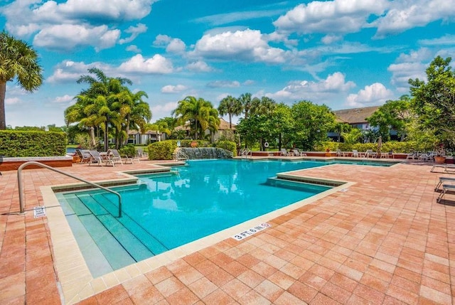 10265 Gandy Blvd N Unit 1409, Saint Petersburg, FL 33702 - community pool featuring a patio