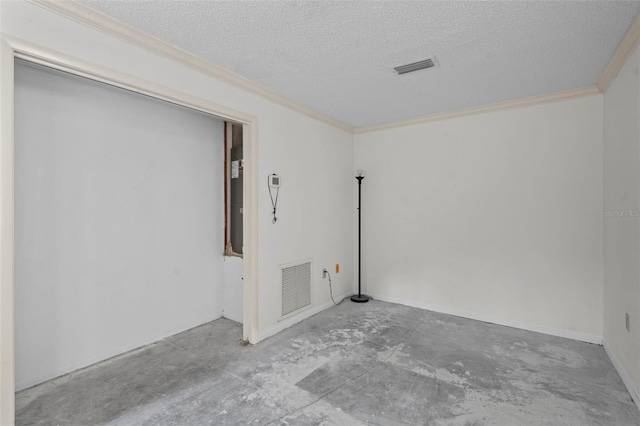 506 Duxbury Ct Unit A, Safety Harbor, FL 34695 - unfurnished room featuring ornamental molding, concrete floors, and a textured ceiling