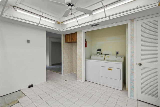 506 Duxbury Ct Unit A, Safety Harbor, FL 34695 - washroom featuring wallpapered walls, ceiling fan, and separate washer and dryer