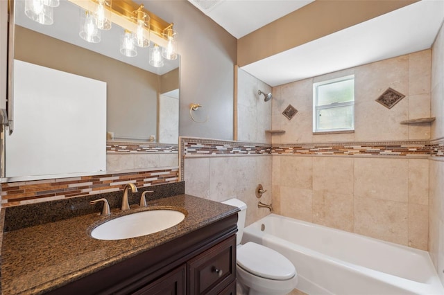 428 Klosterman Rd W, W, Palm Harbor, FL 34683 - bathroom with vanity, shower / bathtub combination, and tile walls