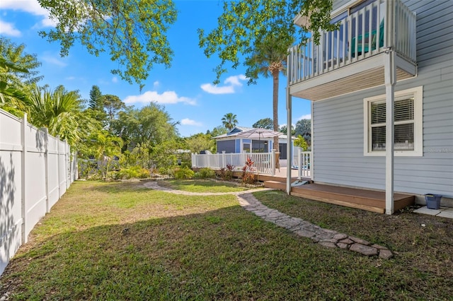 428 Klosterman Rd W, W, Palm Harbor, FL 34683 - view of yard featuring a balcony