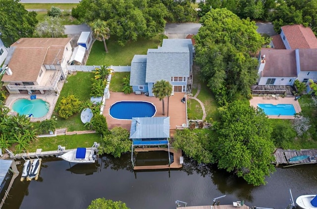 428 Klosterman Rd W, W, Palm Harbor, FL 34683 - drone / aerial view of a pool area and a nearby body of water