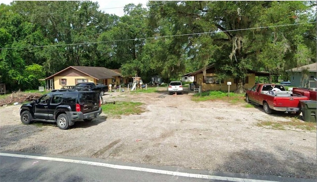102,106,110,202,204 N Jasper Street 102,106,110,202,204, Bushnell, FL 33513 - view of street featuring view of wooded area