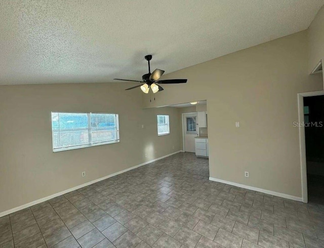 102,106,110,202,204 N Jasper Street 102,106,110,202,204, Bushnell, FL 33513 - unfurnished room featuring vaulted ceiling, a ceiling fan, and a textured ceiling