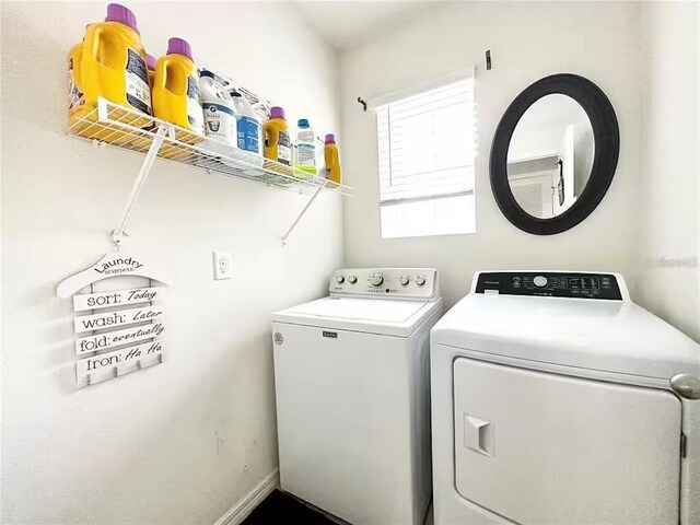 10024 Merry Fawn Ct, Sun City Center, FL 33573 - washroom with washing machine and clothes dryer
