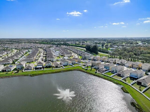 10024 Merry Fawn Ct, Sun City Center, FL 33573 - aerial perspective of suburban area featuring a large body of water