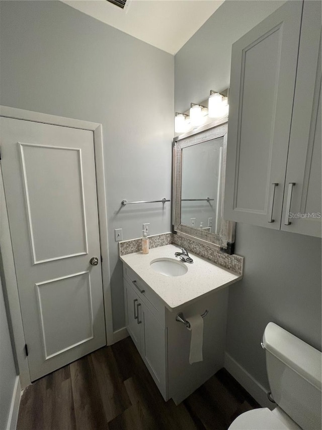 8304 N 13th St, Tampa, FL 33604 - bathroom featuring wood finished floors and vanity