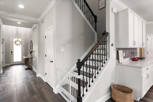 12415 Hitching St, Odessa, FL 33556 - staircase with wood finished floors, ornamental molding, and recessed lighting