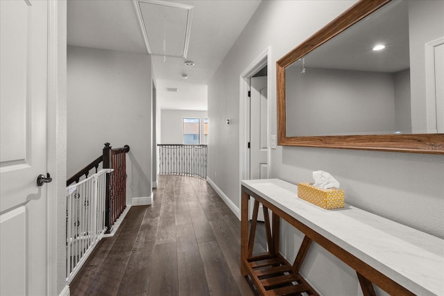 12415 Hitching St, Odessa, FL 33556 - corridor featuring attic access, dark wood-style floors, an upstairs landing, and recessed lighting