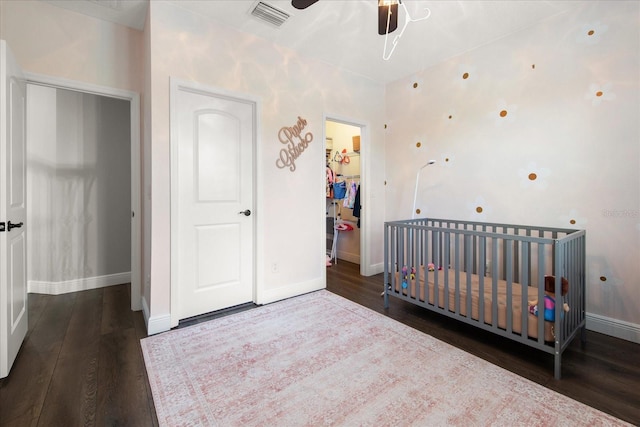12415 Hitching St, Odessa, FL 33556 - bedroom featuring wood finished floors, a closet, a nursery area, and ceiling fan
