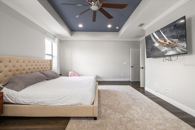 12415 Hitching St, Odessa, FL 33556 - bedroom featuring a tray ceiling, wood finished floors, recessed lighting, ceiling fan, and crown molding