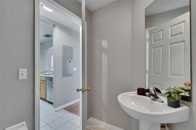 3455 Castle Stone Ct, Valrico, FL 33594 - bathroom featuring electric panel and tile patterned flooring