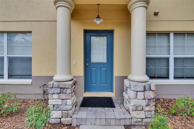 3455 Castle Stone Ct, Valrico, FL 33594 - view of exterior entry featuring stucco siding
