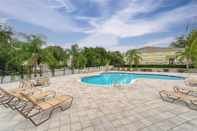 3455 Castle Stone Ct, Valrico, FL 33594 - community pool featuring a patio
