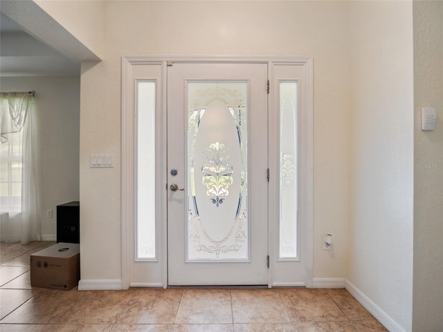 21590 SW 84th Loop, Dunnellon, FL 34431 - entryway with light tile patterned flooring and healthy amount of natural light