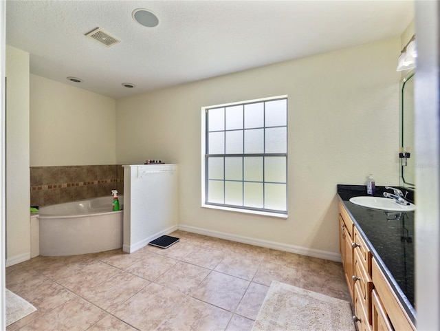 21590 SW 84th Loop, Dunnellon, FL 34431 - full bath featuring vanity, a bath, and tile patterned floors