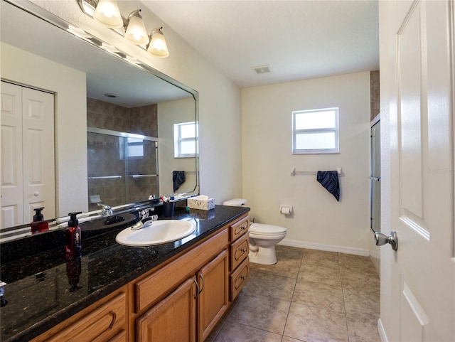 21590 SW 84th Loop, Dunnellon, FL 34431 - full bathroom featuring vanity, a stall shower, and tile patterned flooring