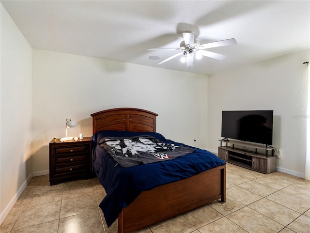 21590 SW 84th Loop, Dunnellon, FL 34431 - bedroom featuring light tile patterned flooring and a ceiling fan