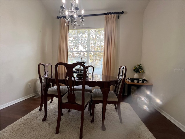 1247 Gentilly Ln, Wesley Chapel, FL 33544 - dining room with a chandelier and wood finished floors