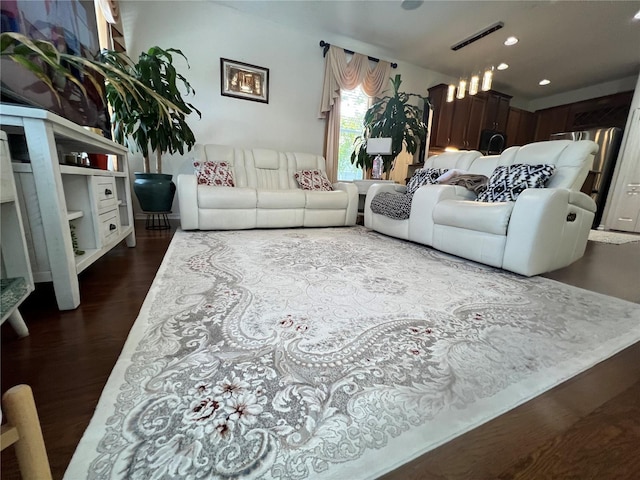 1247 Gentilly Ln, Wesley Chapel, FL 33544 - living room with dark wood-style floors and recessed lighting
