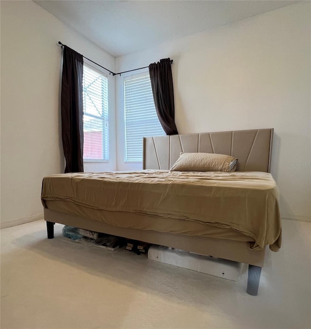 1247 Gentilly Ln, Wesley Chapel, FL 33544 - carpeted bedroom with baseboards