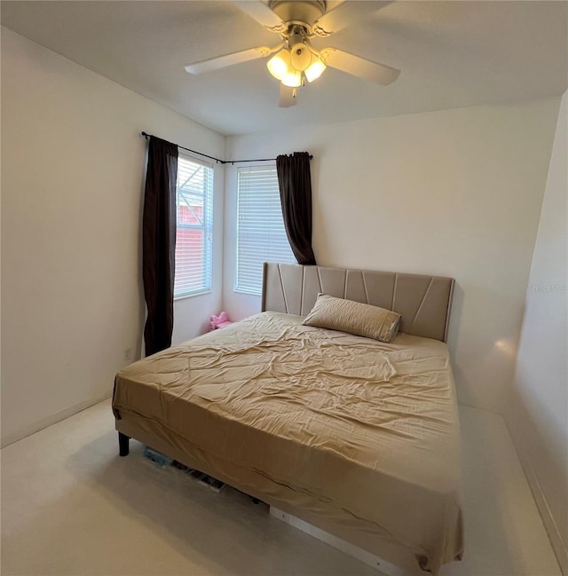 1247 Gentilly Ln, Wesley Chapel, FL 33544 - carpeted bedroom featuring a ceiling fan