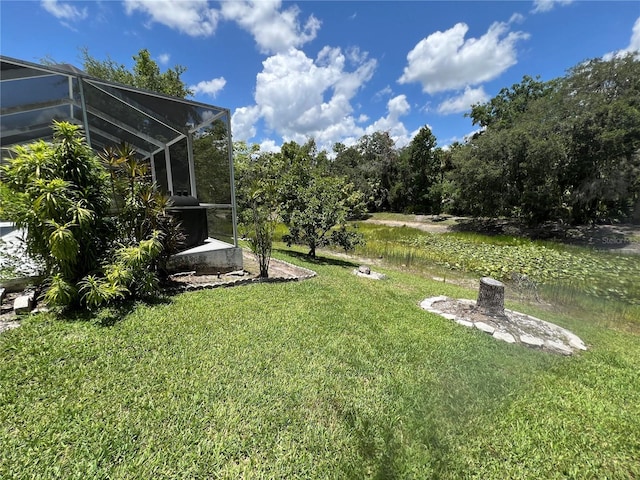 1247 Gentilly Ln, Wesley Chapel, FL 33544 - view of green lawn with a lanai