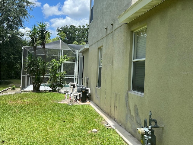 1247 Gentilly Ln, Wesley Chapel, FL 33544 - view of grassy yard with a lanai