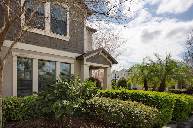 4146 Bexley Village Dr, Land O Lakes, FL 34638 - view of property exterior with stucco siding