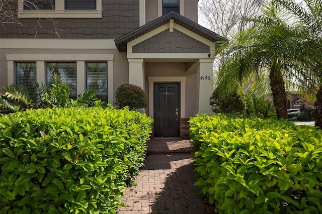 4146 Bexley Village Dr, Land O Lakes, FL 34638 - view of exterior entry with stucco siding