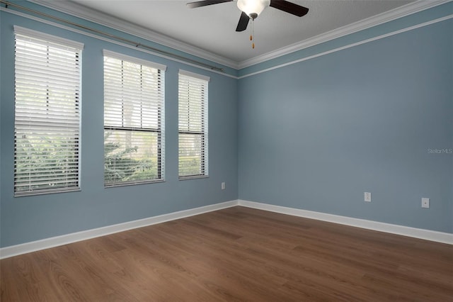 4146 Bexley Village Dr, Land O Lakes, FL 34638 - unfurnished room featuring a ceiling fan, dark wood-type flooring, and ornamental molding